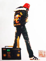 Figure in red fez with boombox